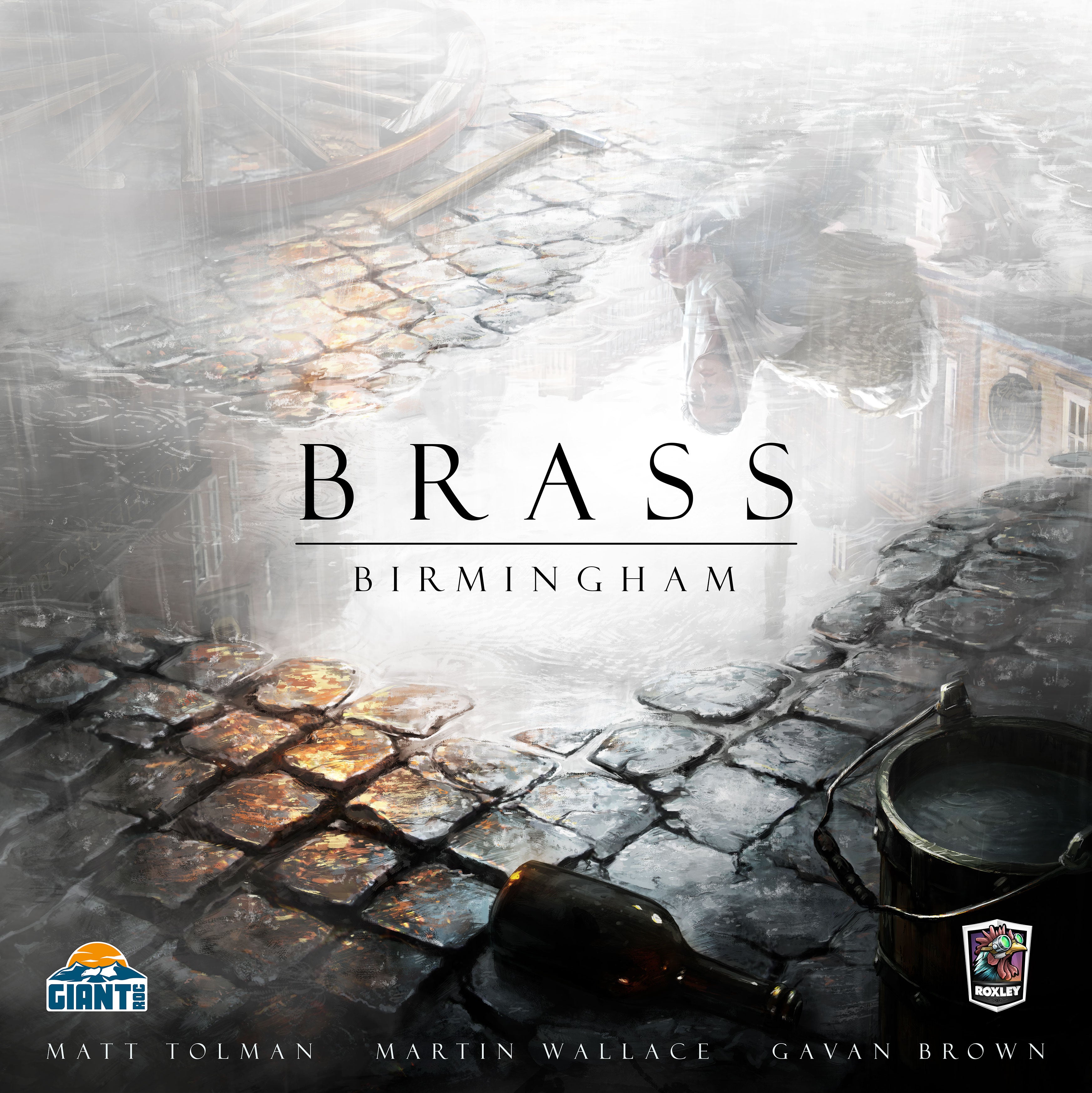 Brass Birmingham Cover der Spielschachtel; Verregnetes Kopfsteinpflaster mit spiegelnde Pfütze